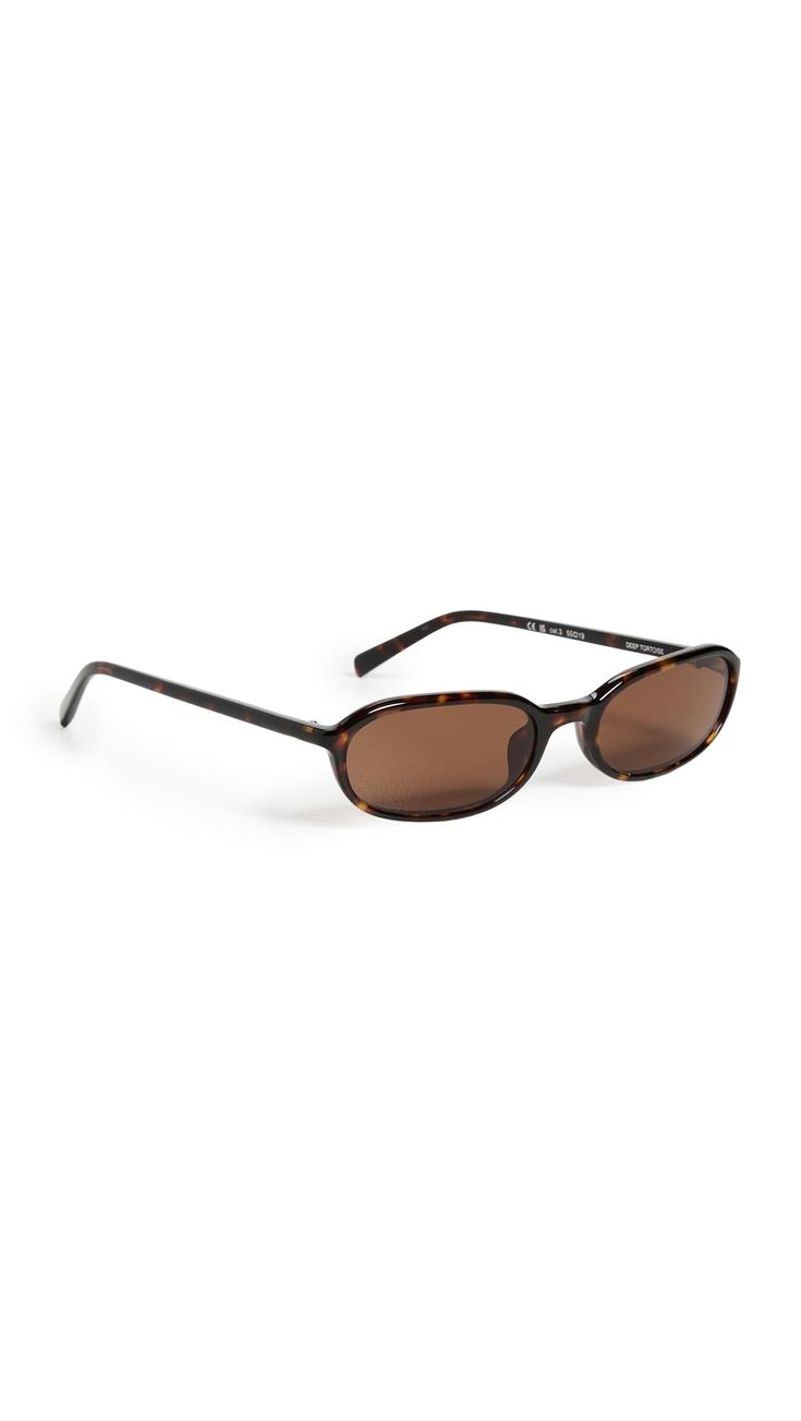Slim oval sunglasses — deep tortoise